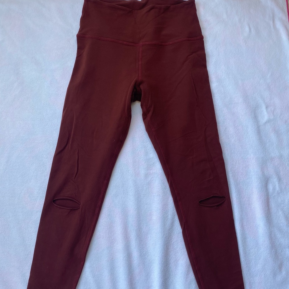 Beyond Yoga Red/Maroon high-waist leggings with moto slit on each leg. Size L